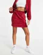 Fila - Nederdel med gennemgående print i rød velour