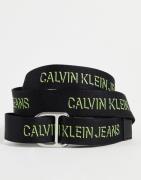 Calvin Klein Jeans - Slider-bælte med D-ring i sort med lime logo