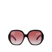 Solbriller i sort/rød acetat