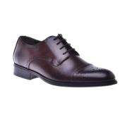 Lace-ups in dark brown calfskin