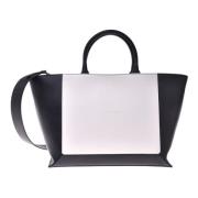 Leather handbag in black and white