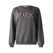 Lukket sweatshirt med unikt design