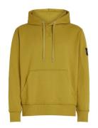 Badge Hoodie Tops Sweatshirts & Hoodies Hoodies Yellow Calvin Klein Je...