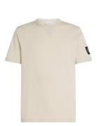 Badge Regular Tee Tops T-Kortærmet Skjorte Cream Calvin Klein Jeans